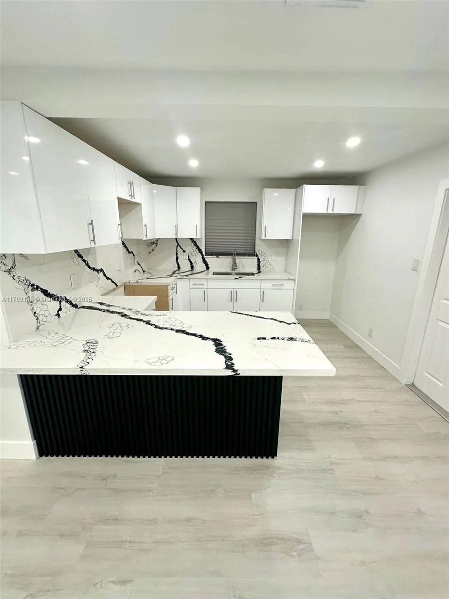 145 NW 2nd St