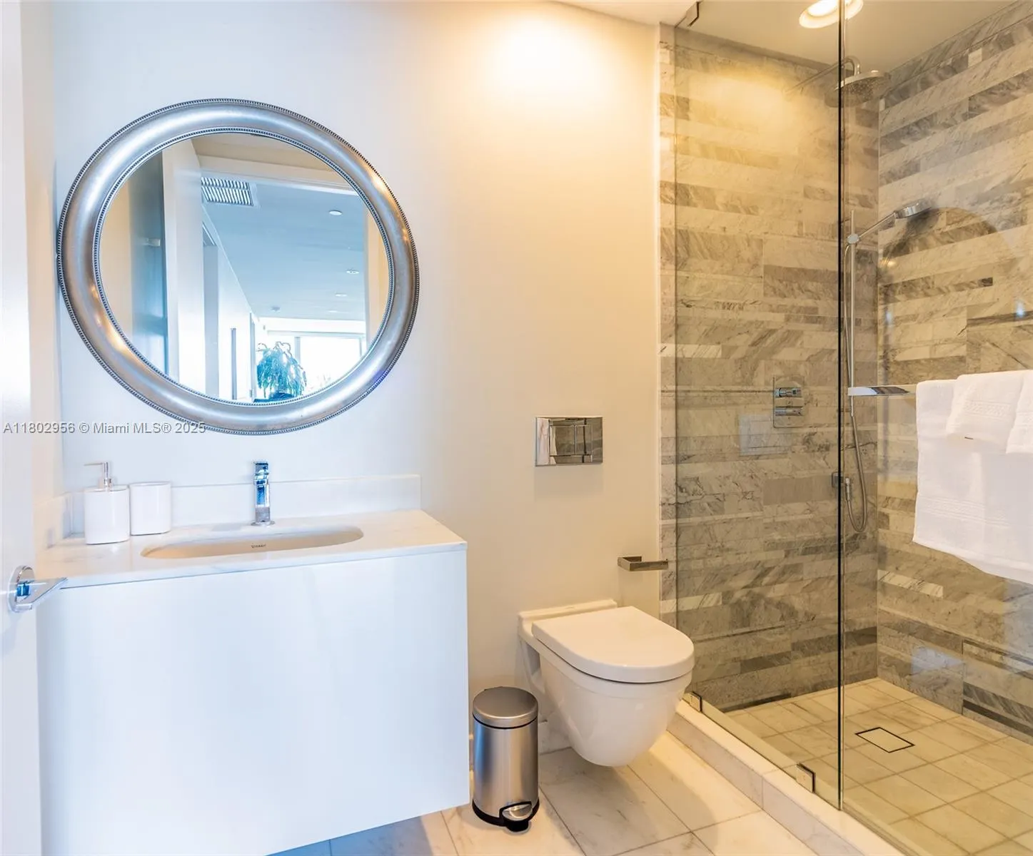 10203 Collins Ave, #302