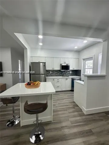 280 NE 169th St