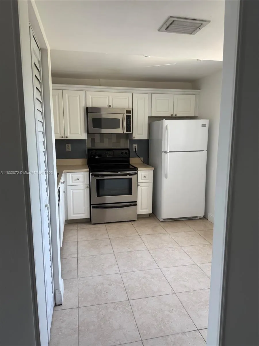 731 N Pine Island Rd, #306