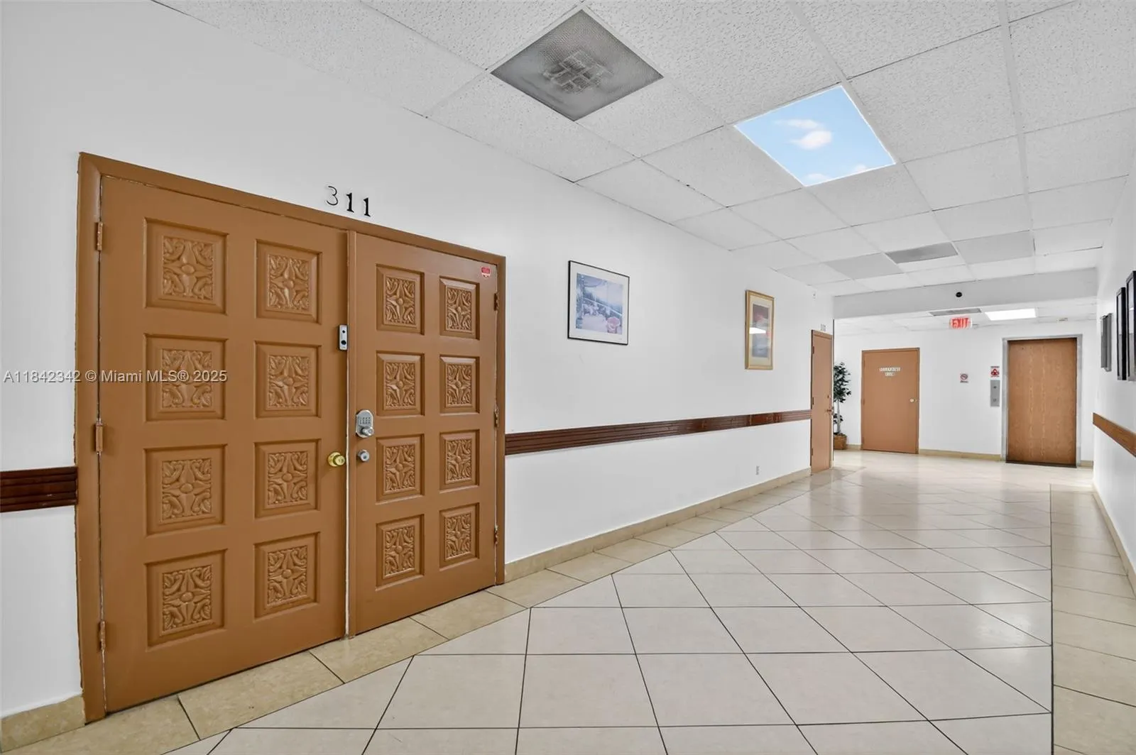 3801 N University Dr, #310-311
