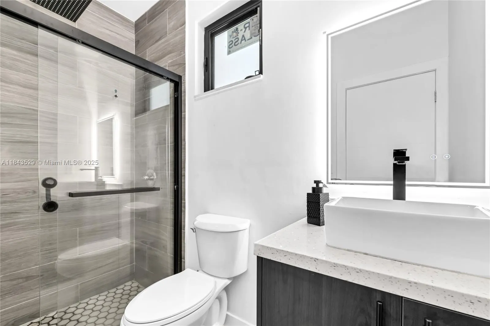 335 NW 15th St