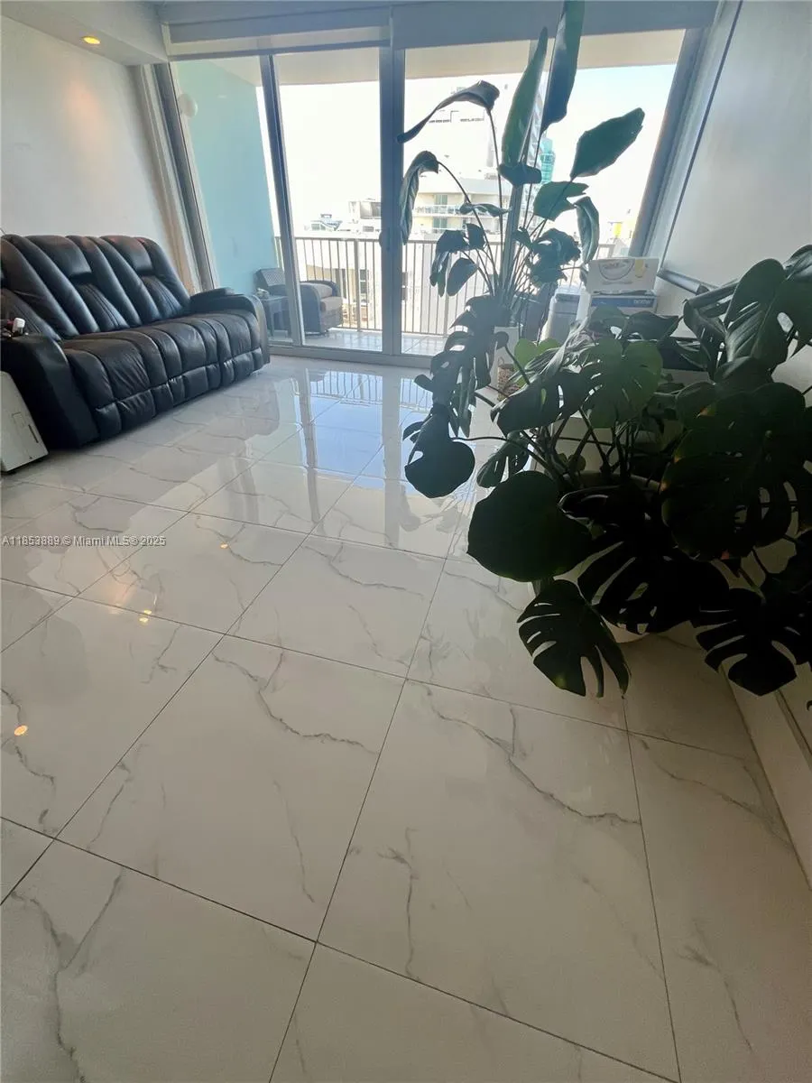 5838 Collins Ave, #14D