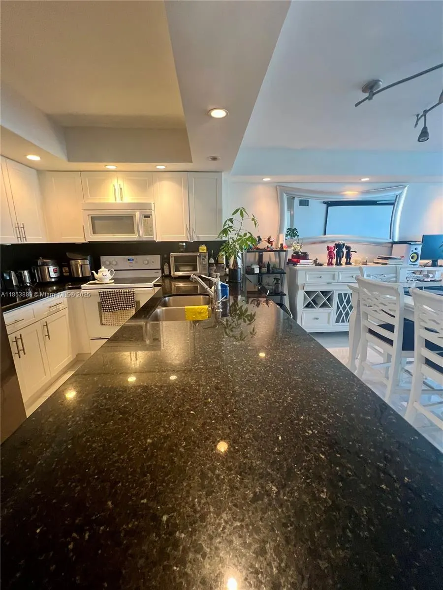 5838 Collins Ave, #14D