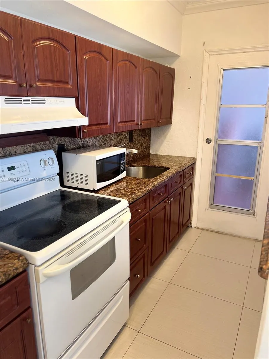 9241 Collins, #1