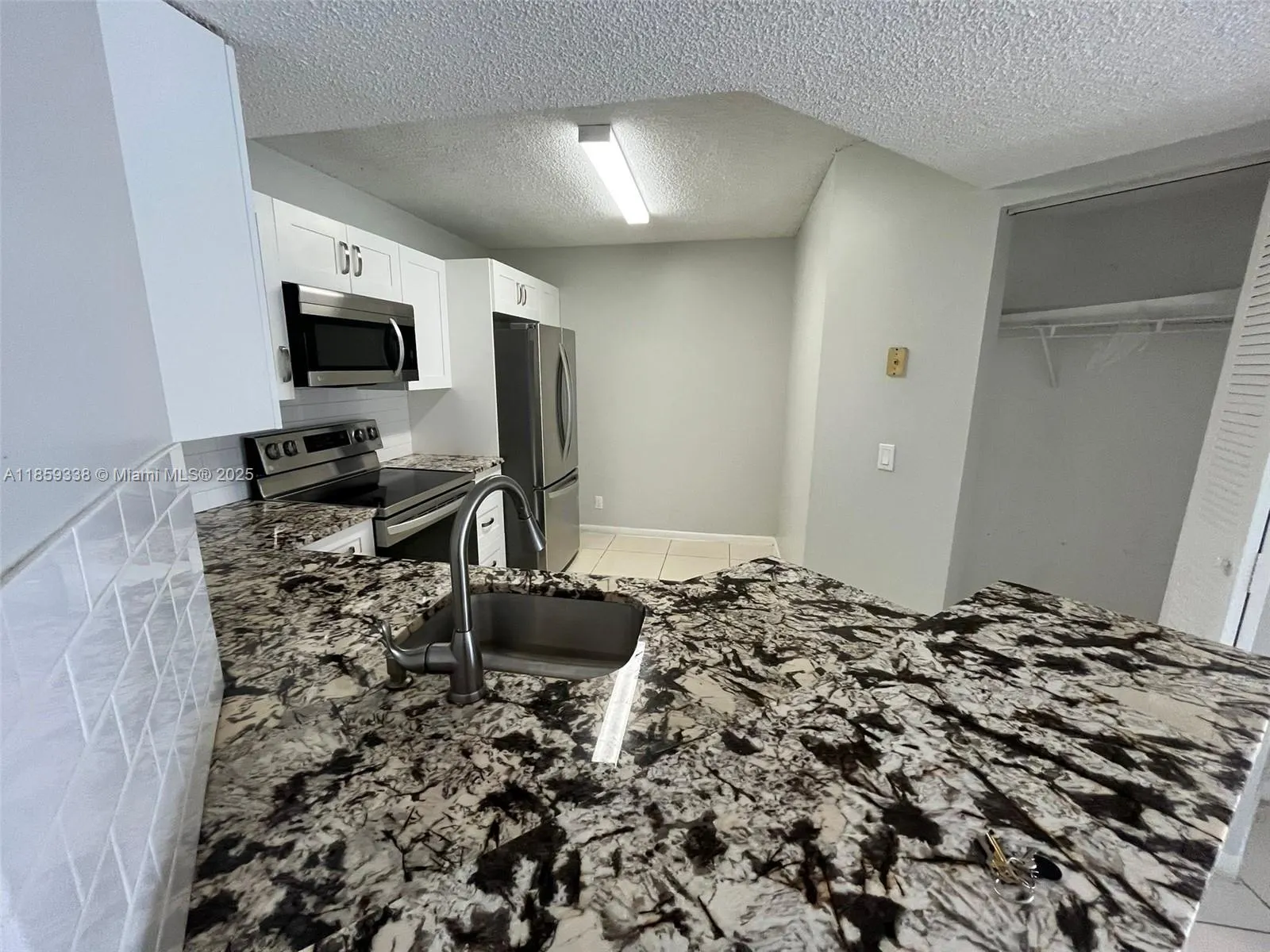8821 Wiles Rd, #203