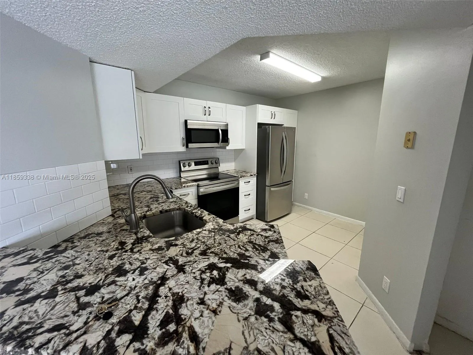 8821 Wiles Rd, #203