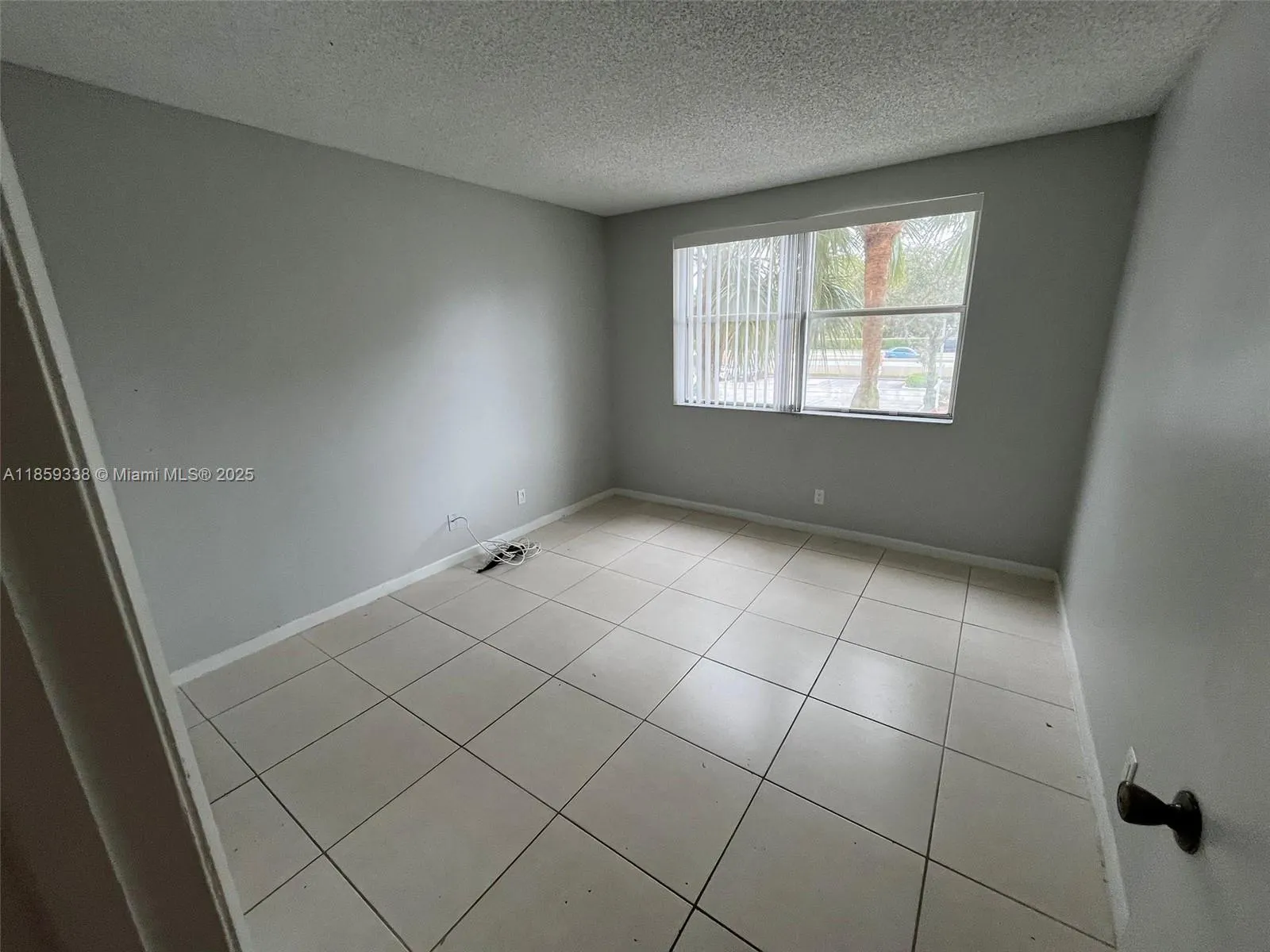 8821 Wiles Rd, #203