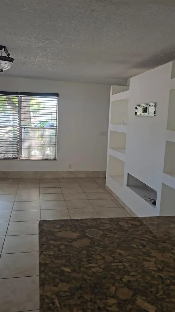 7501 Kimberly Blvd, #104