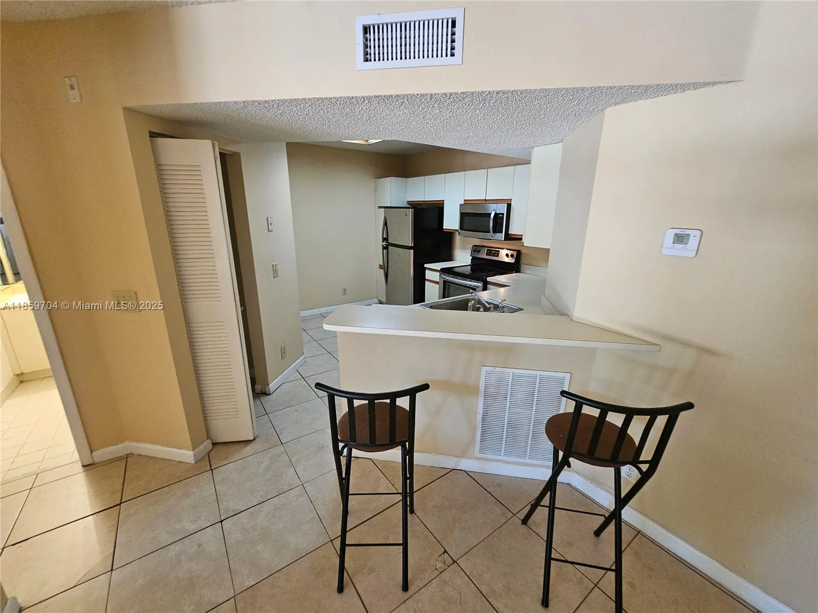 8701 Wiles Rd, #305