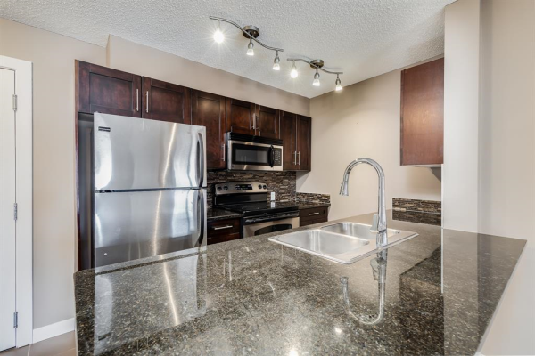 403 Mackenzie Way SW, Airdrie