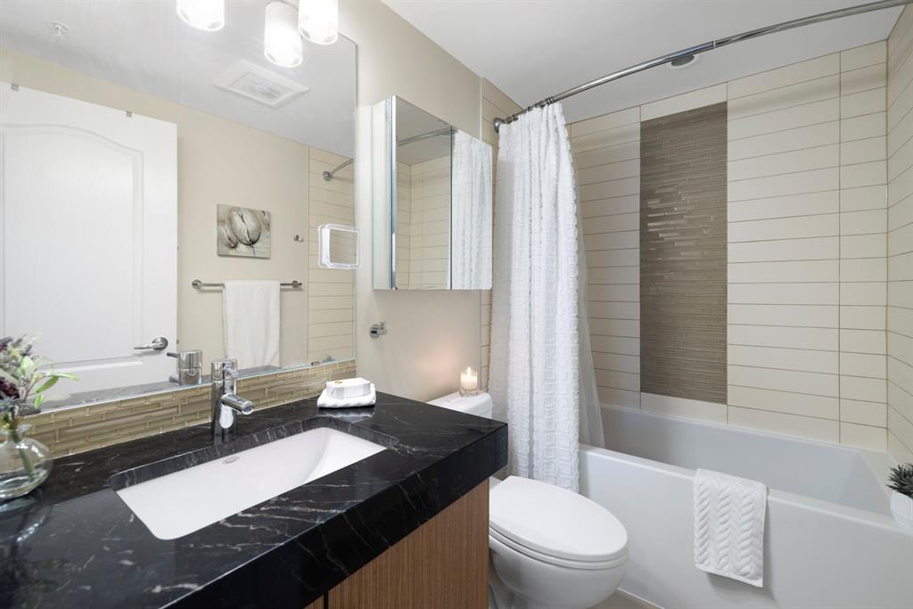 303 13 Avenue SW, #103