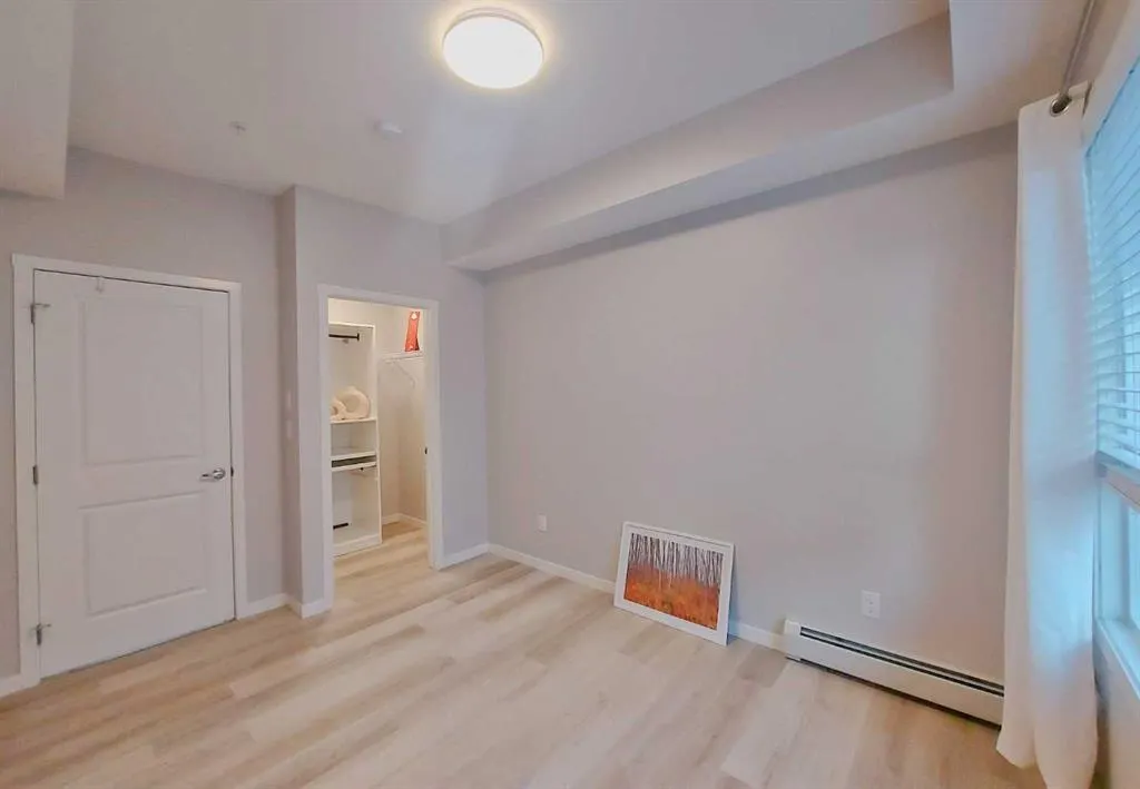 200 HARVEST HILLS Place NE, #211