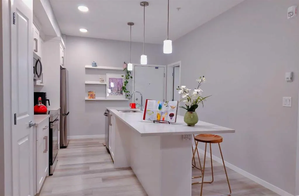 200 HARVEST HILLS Place NE, #211