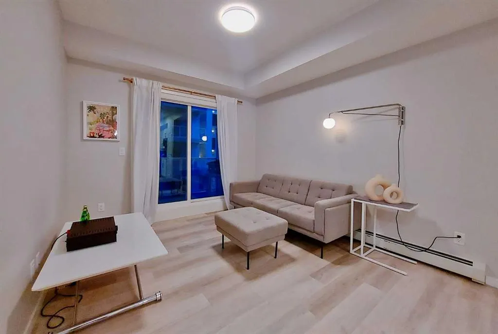 200 HARVEST HILLS Place NE, #211