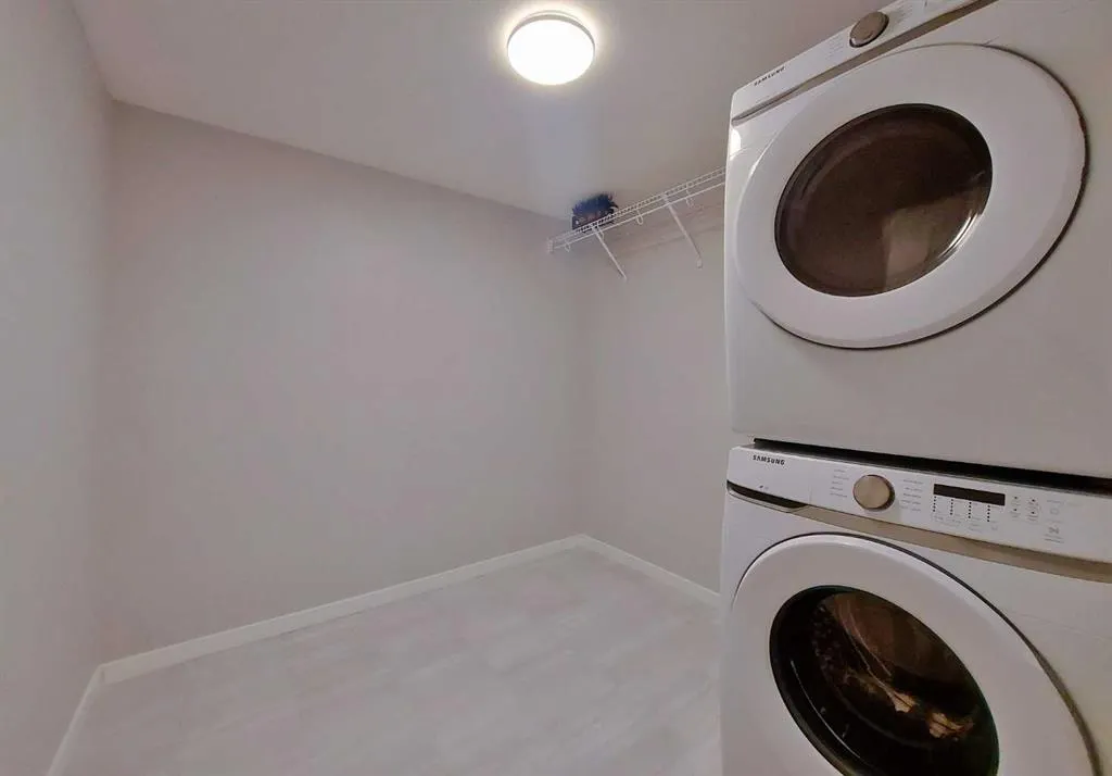 200 HARVEST HILLS Place NE, #211