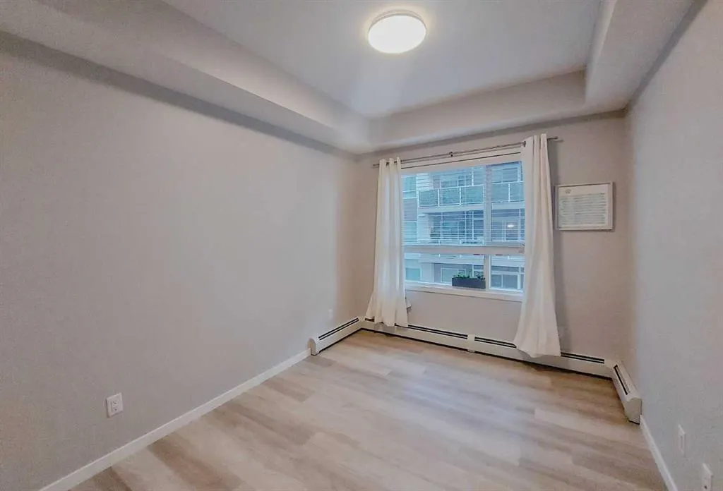 200 HARVEST HILLS Place NE, #211