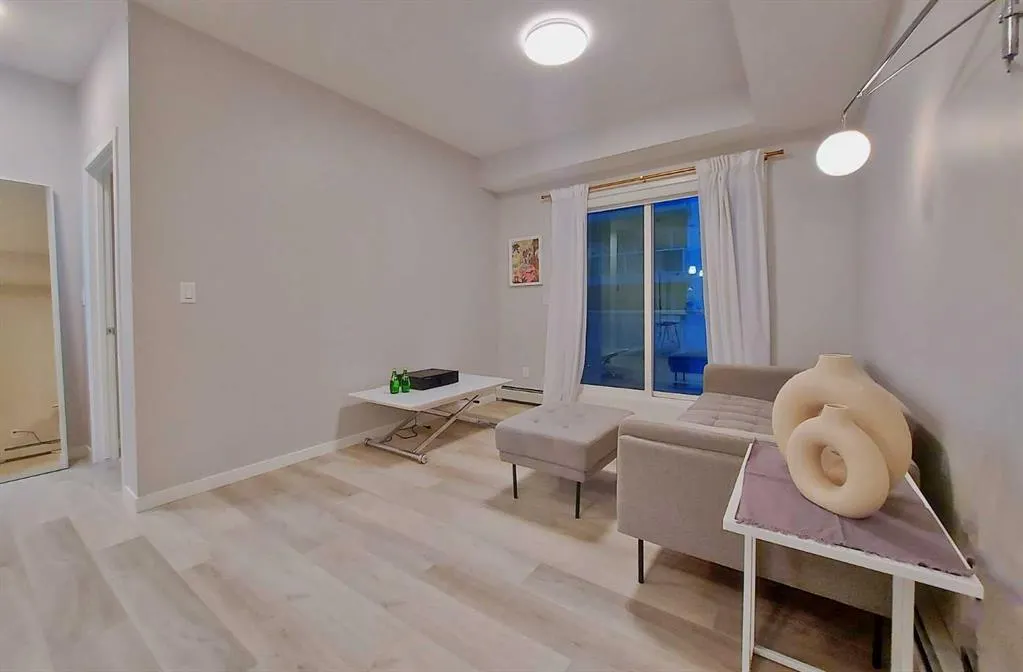 200 HARVEST HILLS Place NE, #211