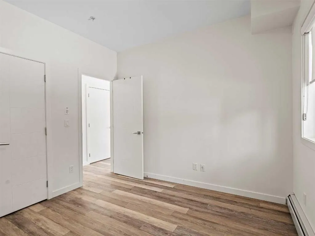 118 18 Avenue SW, #.