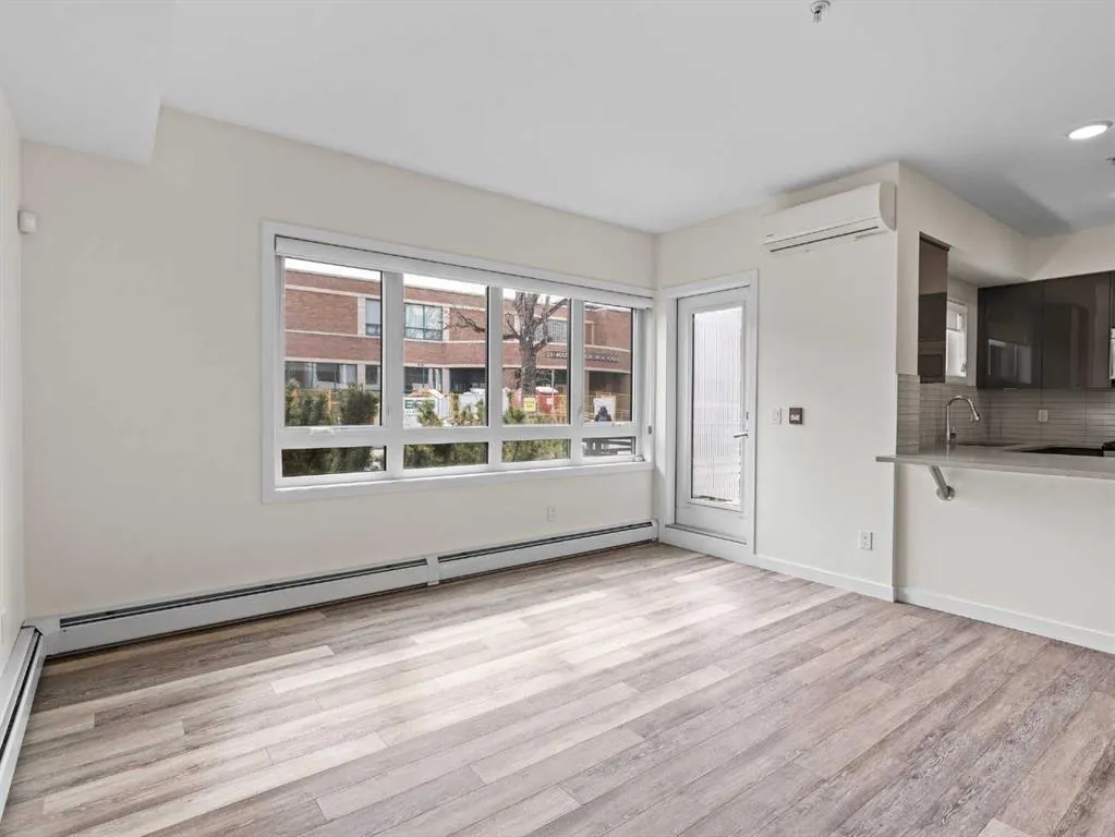 118 18 Avenue SW, #.