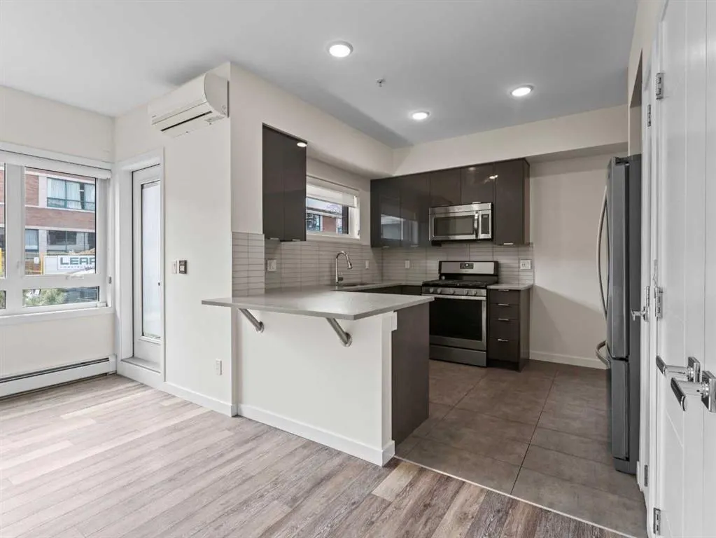 118 18 Avenue SW, #.