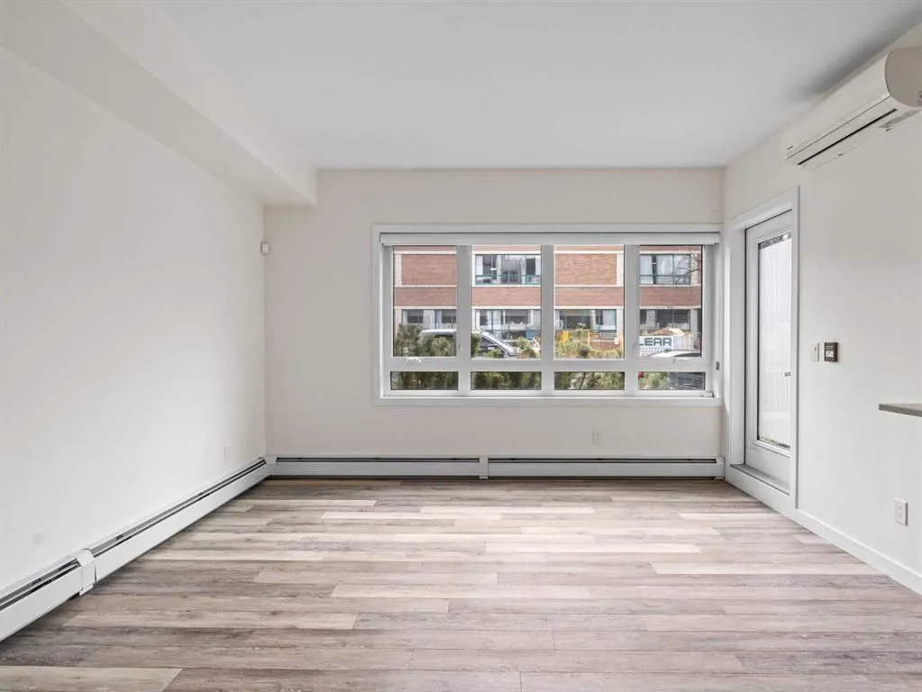118 18 Avenue SW, #.