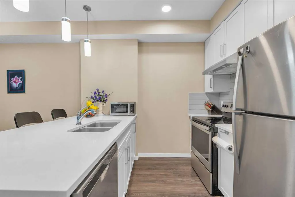 20 Mahogany Mews SE, #104