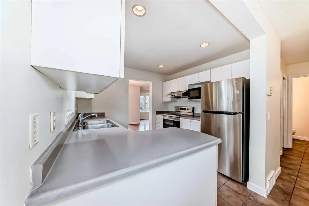 388 Sandarac Drive NW, #111