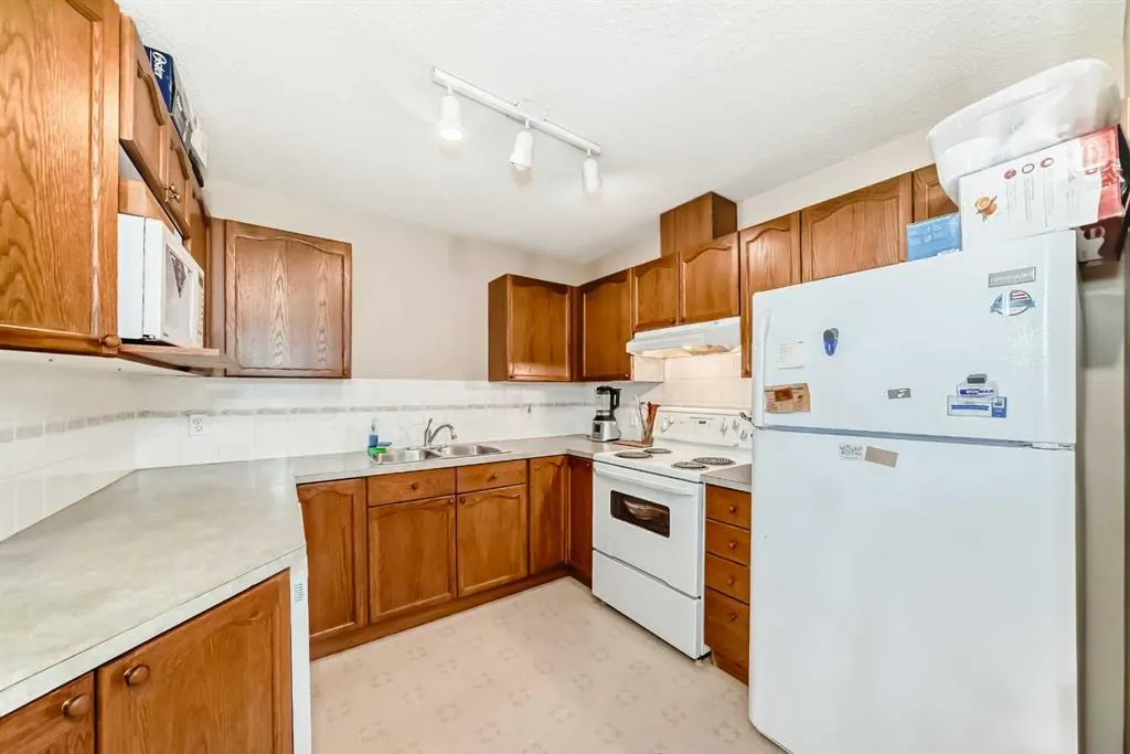 7 Harvest Gold Manor NE, #313