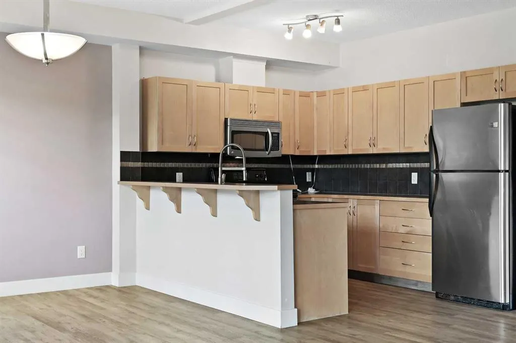 211 Aspen Stone Boulevard SW, #1212