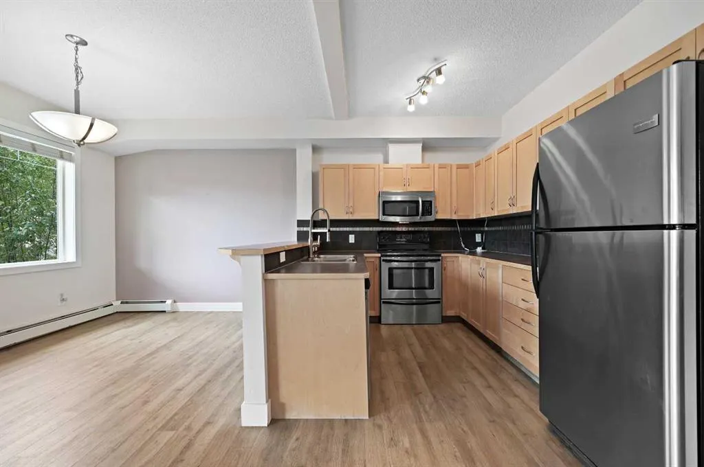 211 Aspen Stone Boulevard SW, #1212