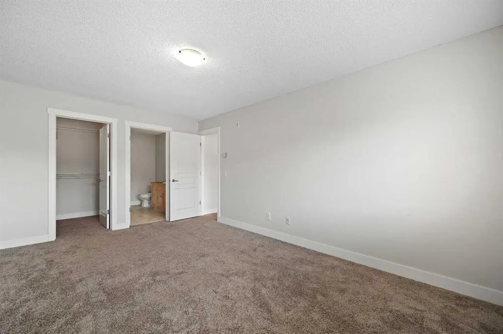 211 Aspen Stone Boulevard SW, #1212