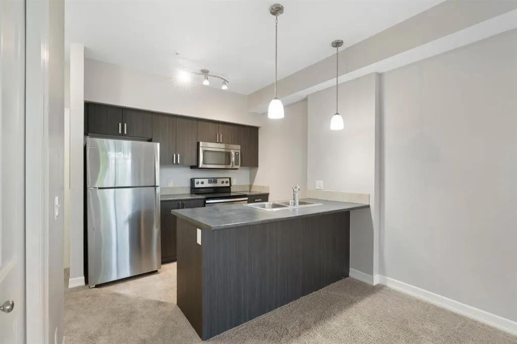117 Copperpond Common SE, #112