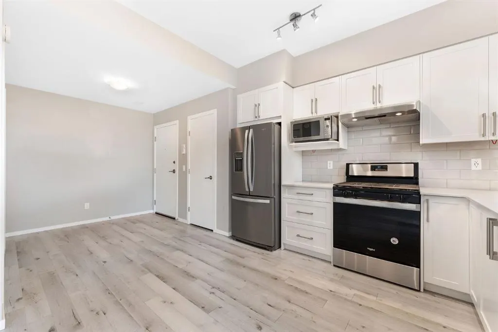 335 Redstone Walk NE, #203