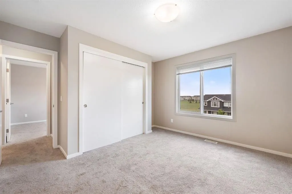 335 Redstone Walk NE, #203