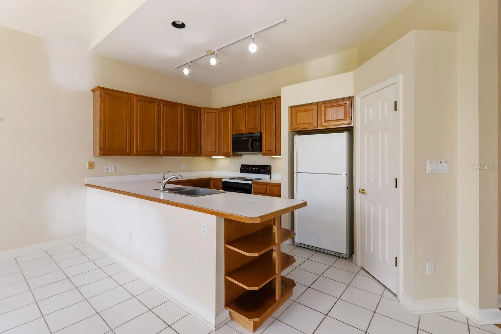 14319 TAMBOURINE DR