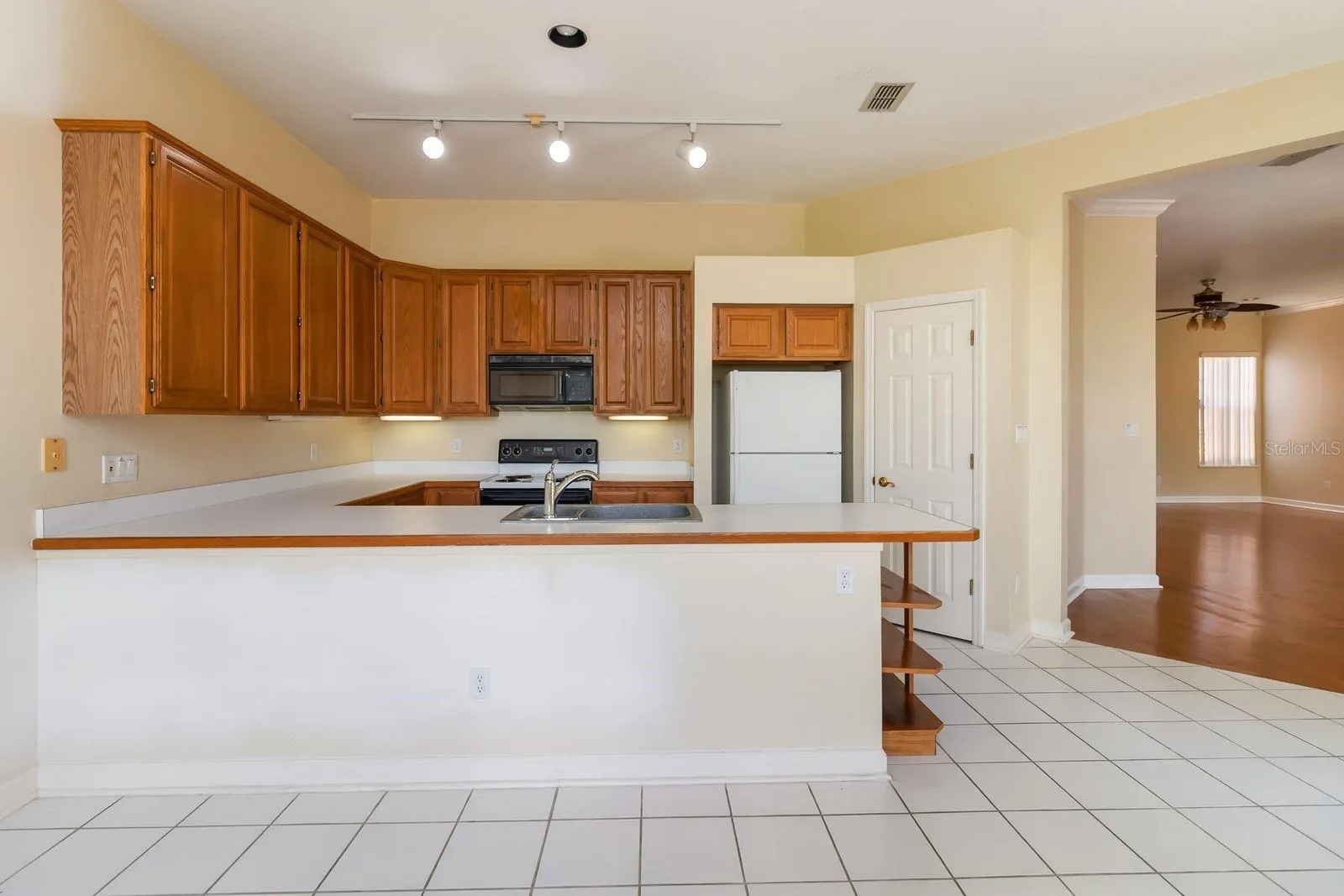 14319 TAMBOURINE DR