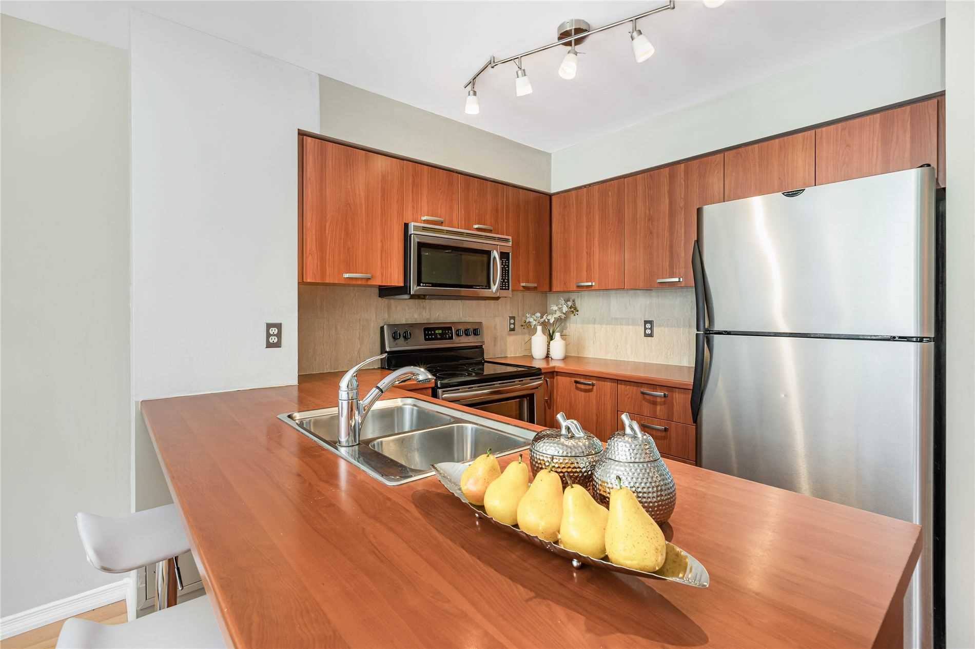55 Harrison Garden Blvd, #201