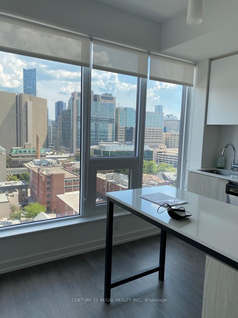 203 College St, #1307