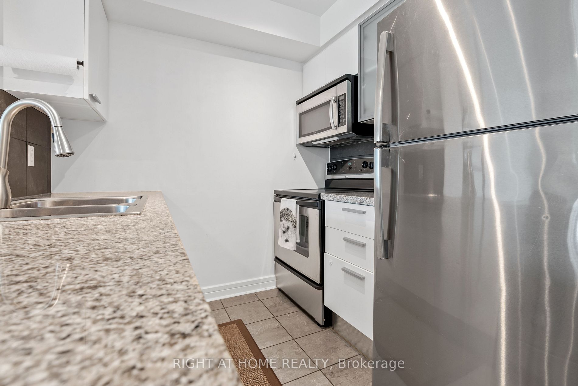 16 Harrison Garden Blvd, #209