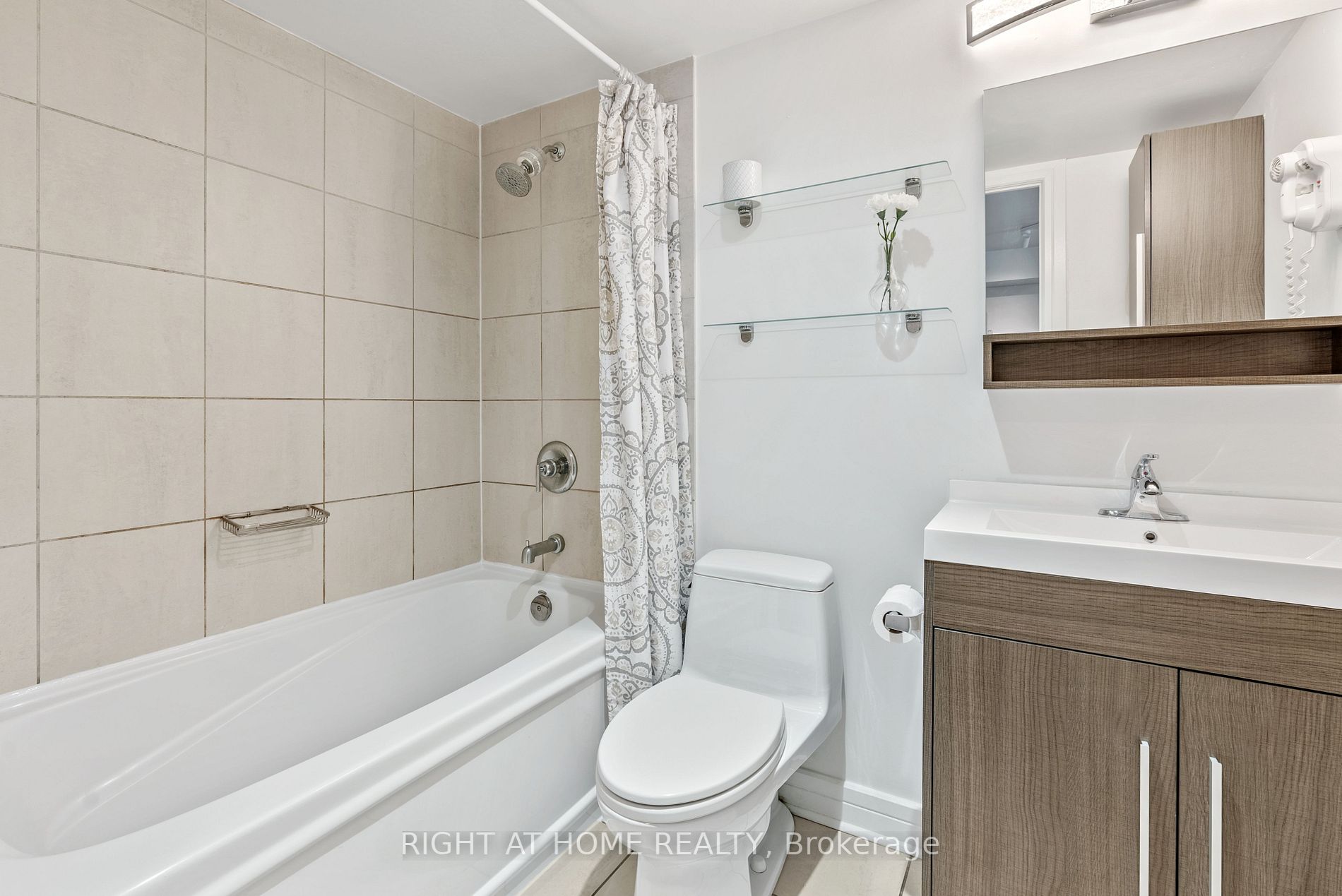 16 Harrison Garden Blvd, #209