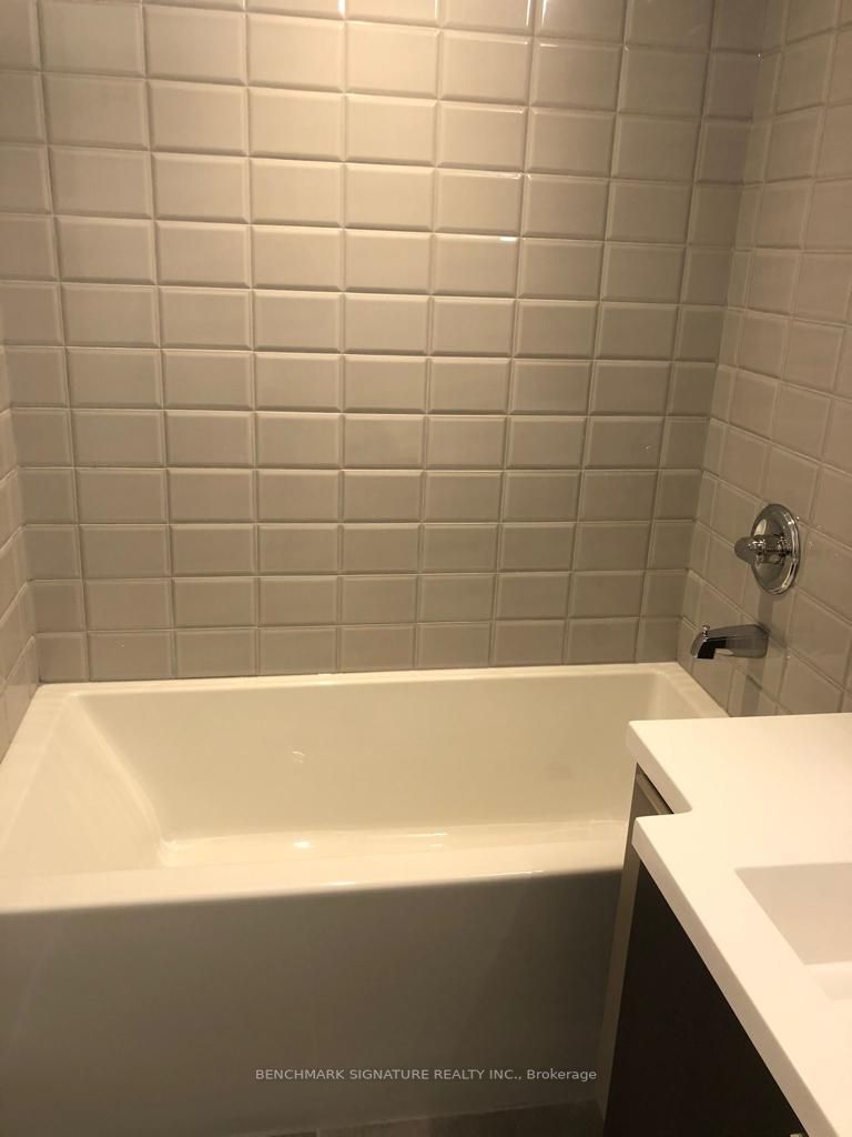 203 College St, #606