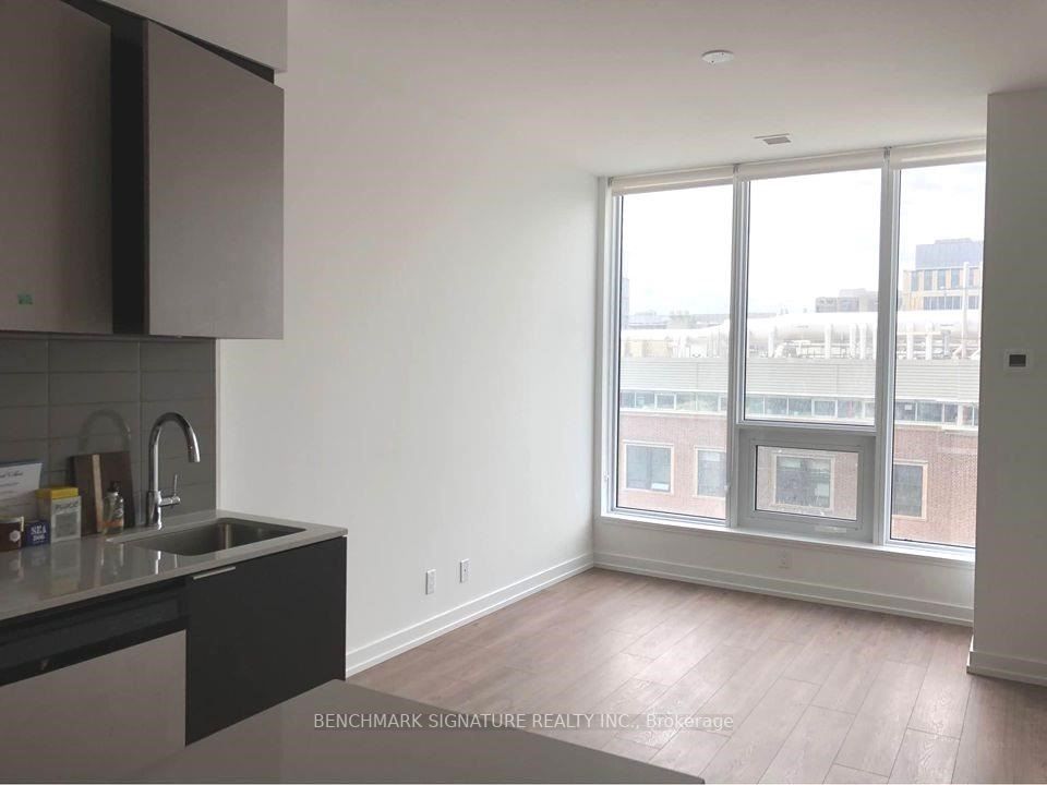 203 College St, #605