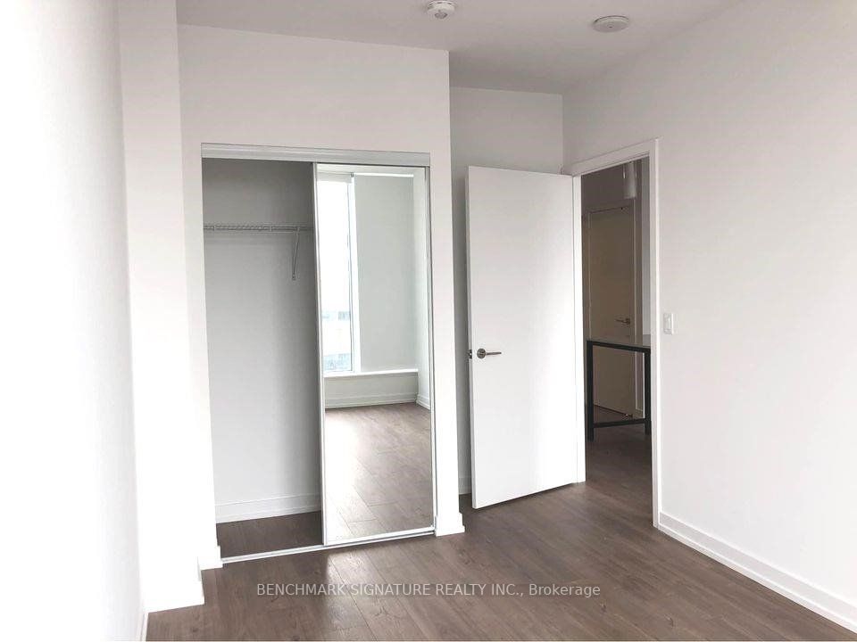 203 College St, #605