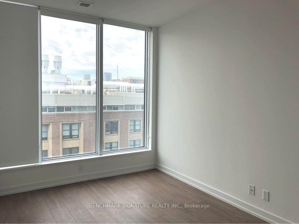 203 College St, #605