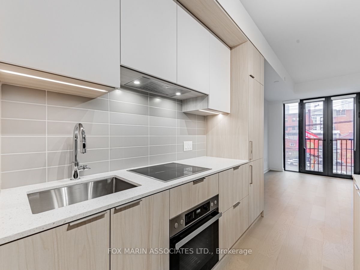 123 Portland Street, #209