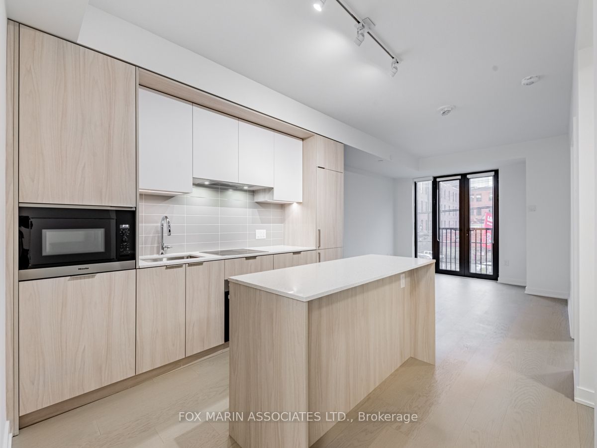 123 Portland Street, #209