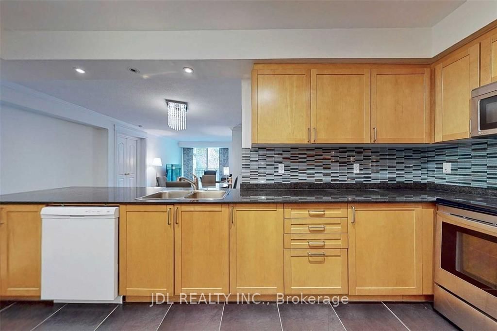 18 William Carson Crescent #211