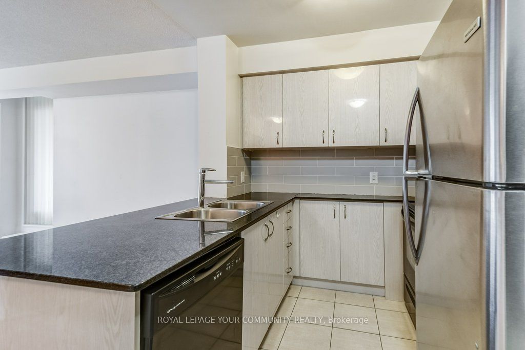 5793 Yonge St, #211