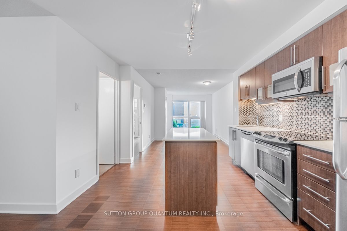 1169 Queen St W, #203
